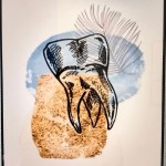 A framed piece of modern art featuring a stylized black-and-white sketch of a tooth over abstract blue and tan watercolor shapes